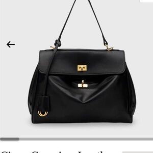 Elegant Black Leather Handbag Worn once